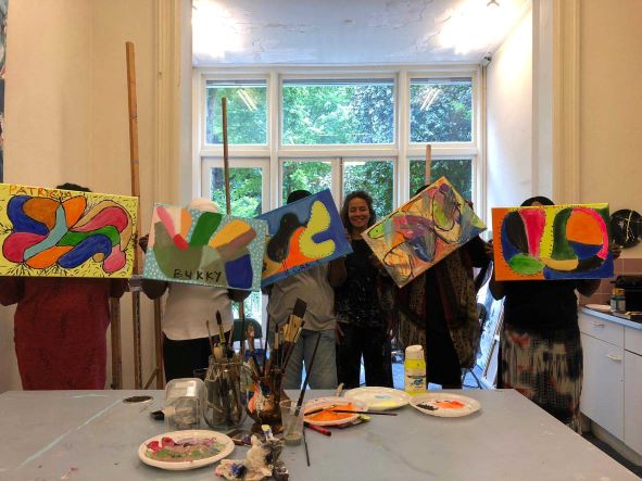 Celebrating together! ~ 16 July 2019<br /><p>Celebrating the end of another school year together!</p><p>Before the summer holidays began, we all came together to celebrate the growth, trust and confidence that we see in the group.</p><p>Our participants were able to express themselves creatively in an art workshop! Thanks to Isabelle Roskam, for hosting us at her beautiful studio in Amsterdam! We had a wonderful time!<br />Please see Isabelle’s beautiful art at:  https://www.isabelleroskam.nl/</p><p>Our team will be busy this summer working on ways to expand our program and help more within our community 💙 We will be back again in September with our original participants, as well as some new ones!</p>